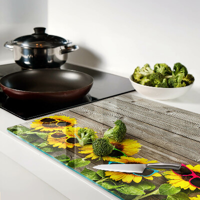 Glas-Schneidebrett mit Sonnenblumenmotiv und Sonnenbrillen-Design