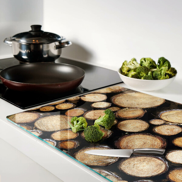 Glas-Schneidebrett mit Motiv von Holzstämmen im Querschnitt