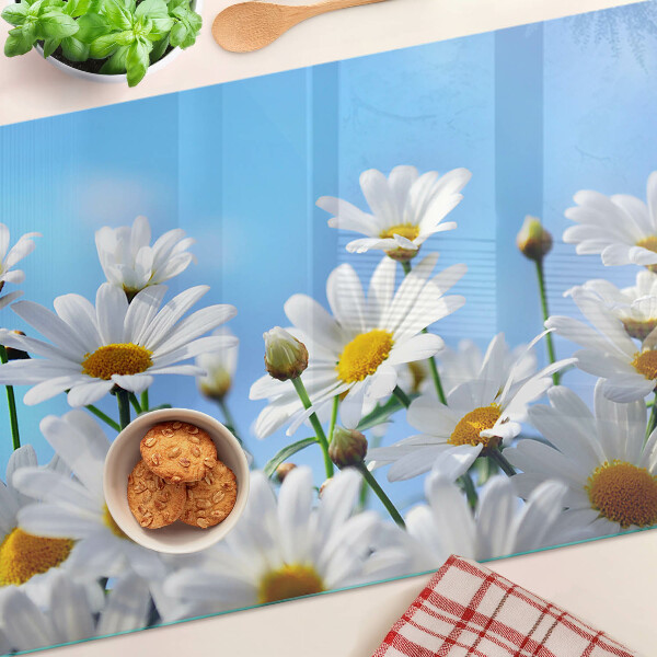 Schneidebrett Glas mit Gänseblümchen-Motiv auf blauem Hintergrund