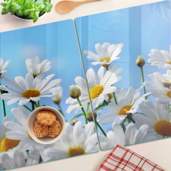 Schneidebrett Glas mit Gänseblümchen-Motiv auf blauem Hintergrund