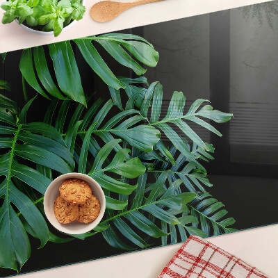 Glas-Schneidebrett mit Motiv tropischer Blätter