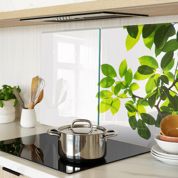 Schneidebrett mit Motiv ‚Blätter vor hellem Himmel‘