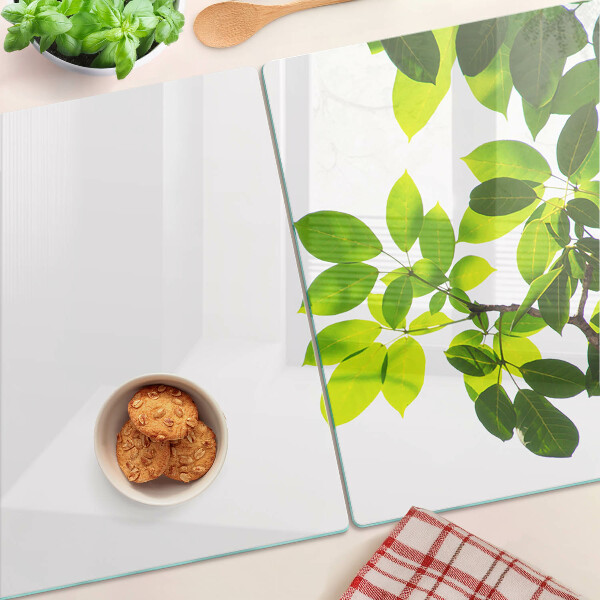 Schneidebrett mit Motiv ‚Blätter vor hellem Himmel‘