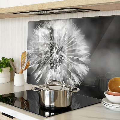 Glas-Schneidebrett mit schwarzweißem Löwenzahnmotiv