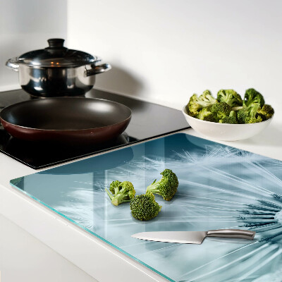 Glas-Schneidebrett mit Motiv Löwenzahn vor dem Himmel