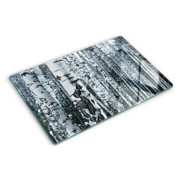 Glas-Schneidebrett mit dem Motiv „Birkenwald in Winterlandschaft“