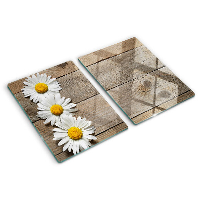 Schneidebrett mit Blumenmotiv auf Holzgrund