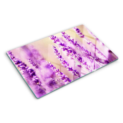 Schneidebrett glas Lavendelblüten auf einem Farbverlaufshintergrund