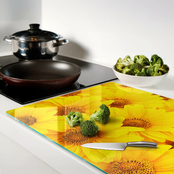 Schneidebrett glas Sonnenblumen auf gelbem Hintergrund