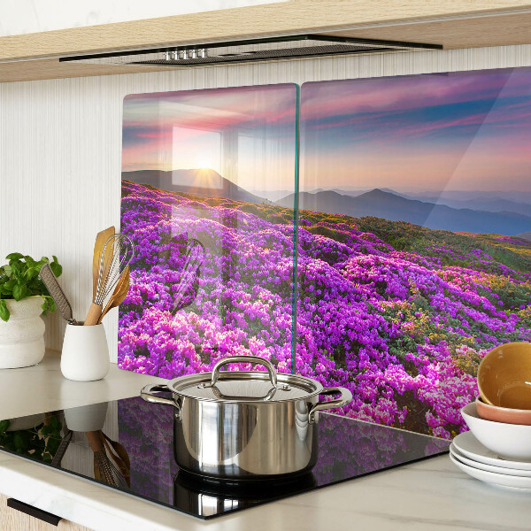 Schneidebrett Glas mit Motiv einer Blumenlandschaft bei Sonnenuntergang