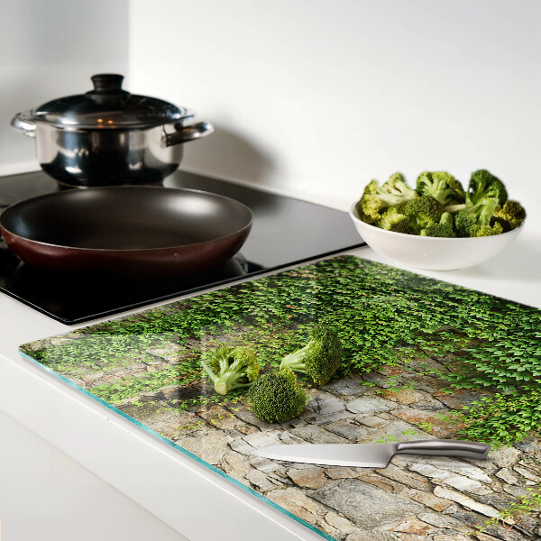 Glas-Schneidebrett mit grünem Wandmotiv und Moosdesign