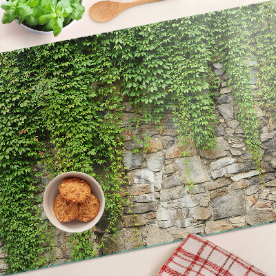Glas-Schneidebrett mit grünem Wandmotiv und Moosdesign