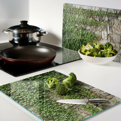 Glas-Schneidebrett mit grünem Wandmotiv und Moosdesign
