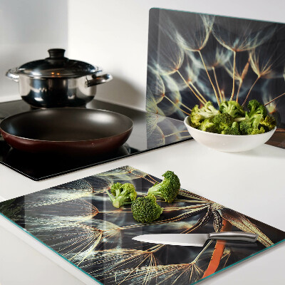 Glas-Schneidebrett mit Motiv einer Löwenzahn-Makrofotografie