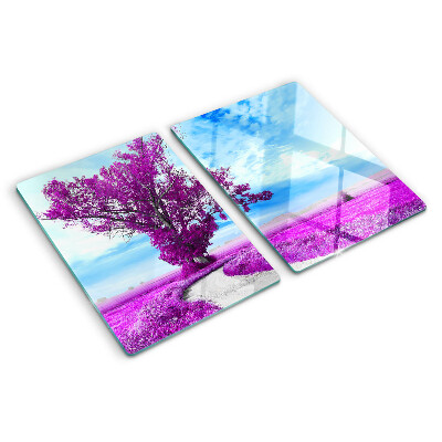 Schneidebrett mit Motiv eines violetten Baumes vor dem Himmel