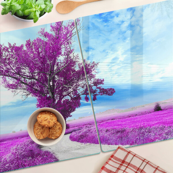 Schneidebrett Ein violetter Baum vor dem Himmel