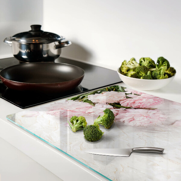 Glas schneidebrett Pfingstrosen auf Marmorgrund