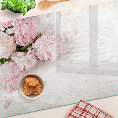 Glas schneidebrett Pfingstrosen auf Marmorgrund