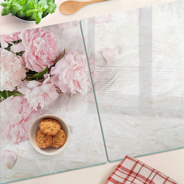 Glas schneidebrett Pfingstrosen auf Marmorgrund