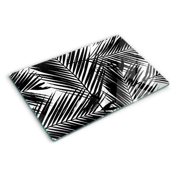 Schneidebrett Glas mit schwarzem und weißem Palmenblattmotiv