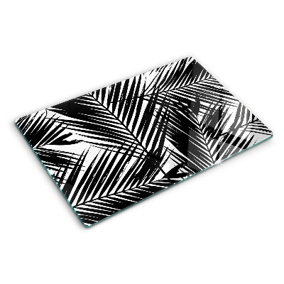 Schneidebrett Glas mit schwarzem und weißem Palmenblattmotiv