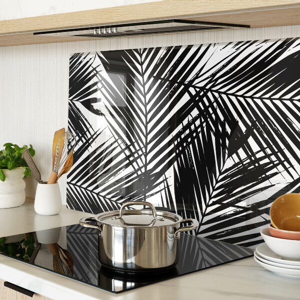 Schneidebrett Glas mit schwarzem und weißem Palmenblattmotiv