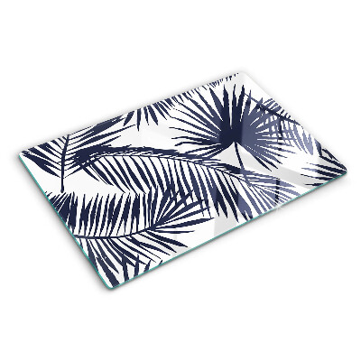 Glas schneidebrett Palmenblätter auf weißem Hintergrund