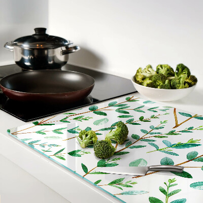 Schneidebrett mit grünem Blatt- und Zweigmotiv