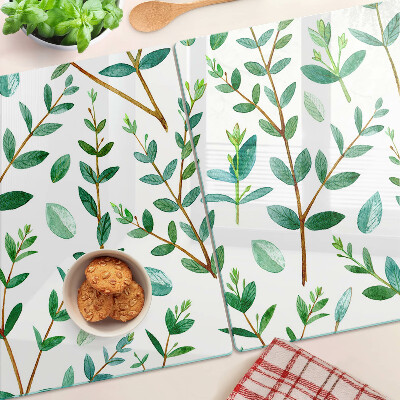 Schneidebrett mit grünem Blatt- und Zweigmotiv