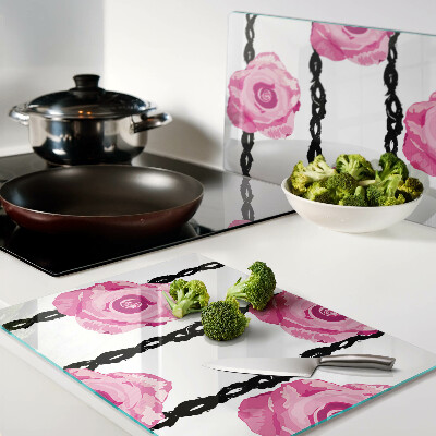 Schneidebrett glas Rosen auf schwarzem Hintergrund