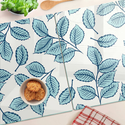 Schneidebrett Glas mit Blattmotiv in Blautönen