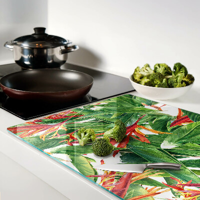 Schneidebrett Glas mit Motiv aus tropischen Blättern und Blüten