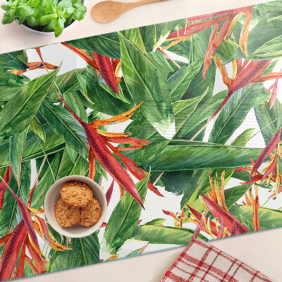 Schneidebrett Glas mit Motiv aus tropischen Blättern und Blüten