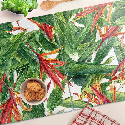 Schneidebrett Glas mit Motiv aus tropischen Blättern und Blüten