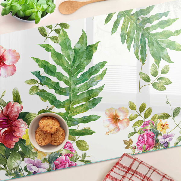 Glas-Schneidebrett mit Blumenmuster und Blättern