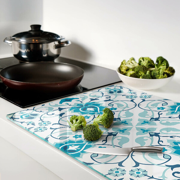 Glas-Schneidebrett mit Blumenmuster in Blautönen