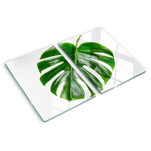 Glas Schneidebrett mit Monstera-Blättern
