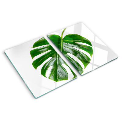 Glas Schneidebrett mit Monstera-Blättern