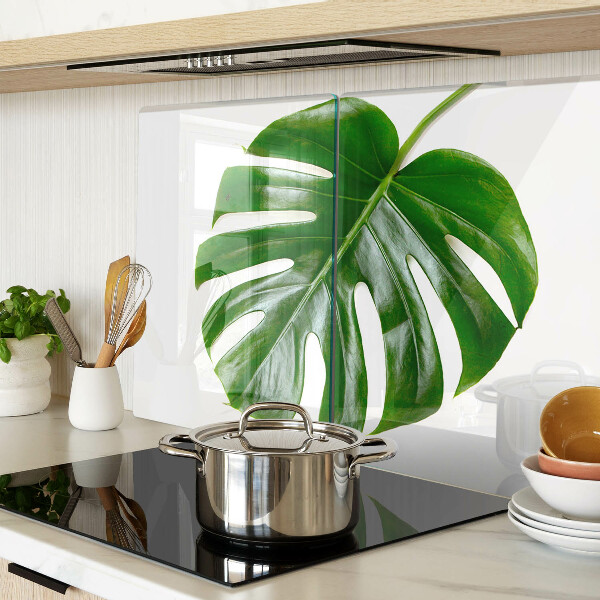 Glas Schneidebrett mit Monstera-Blättern