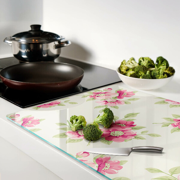 Glas-Schneidebrett mit Blumenmuster in Rosatönen