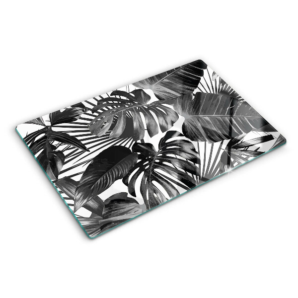 Glas-Schneidebrett mit tropischen Blättern in Schwarzweiß