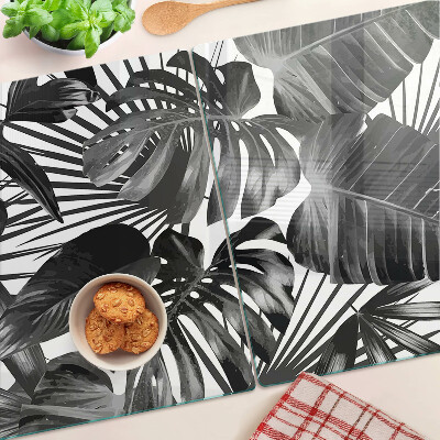 Glas-Schneidebrett mit tropischen Blättern in Schwarzweiß