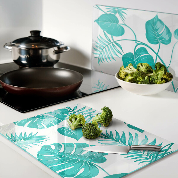 Schneidebrett mit Motiv tropischer Blätter in Grüntönen