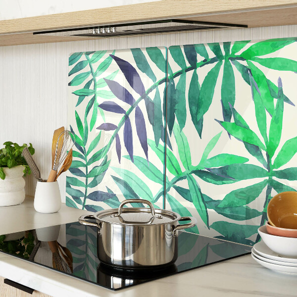 Glas-Schneidebrett mit Palmenblättern im Aquarellstil