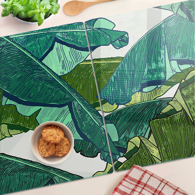 Glas-Schneidebrett mit Motiv aus Palmenblättern in Grüntönen