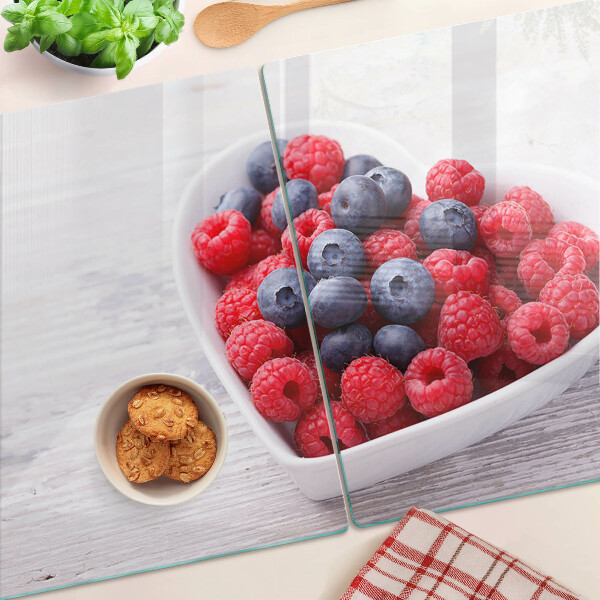 Glas-Schneidebrett mit herzförmigem Motiv aus Früchten