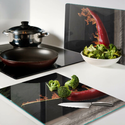 Schneidebrett Feuer und Chilischote