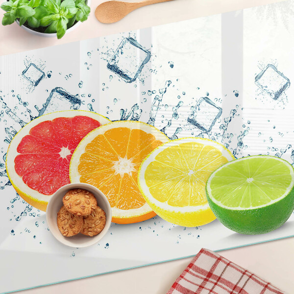 Schneidebrett glas Zitrusfrüchte in bunten Scheiben