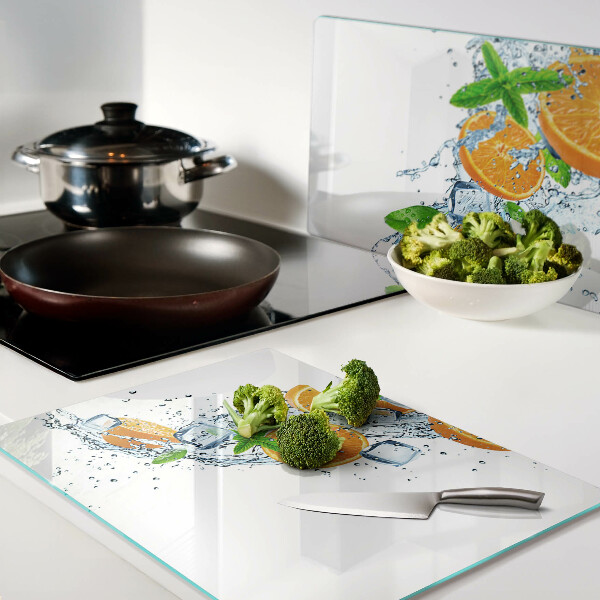 Schneidebrett Glas mit Zitrusfrüchten-Motiv auf Wasserhintergrund