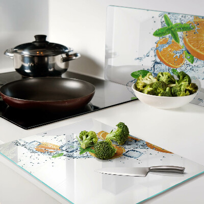 Schneidebrett Glas mit Zitrusfrüchten-Motiv auf Wasserhintergrund